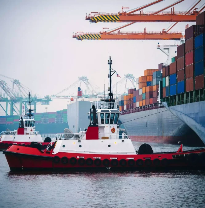 container-ship-and-tugboats-in-harbor-tacoma-was-2023-11-27-05-26-09-utc-min-2048x1363-1.webp
